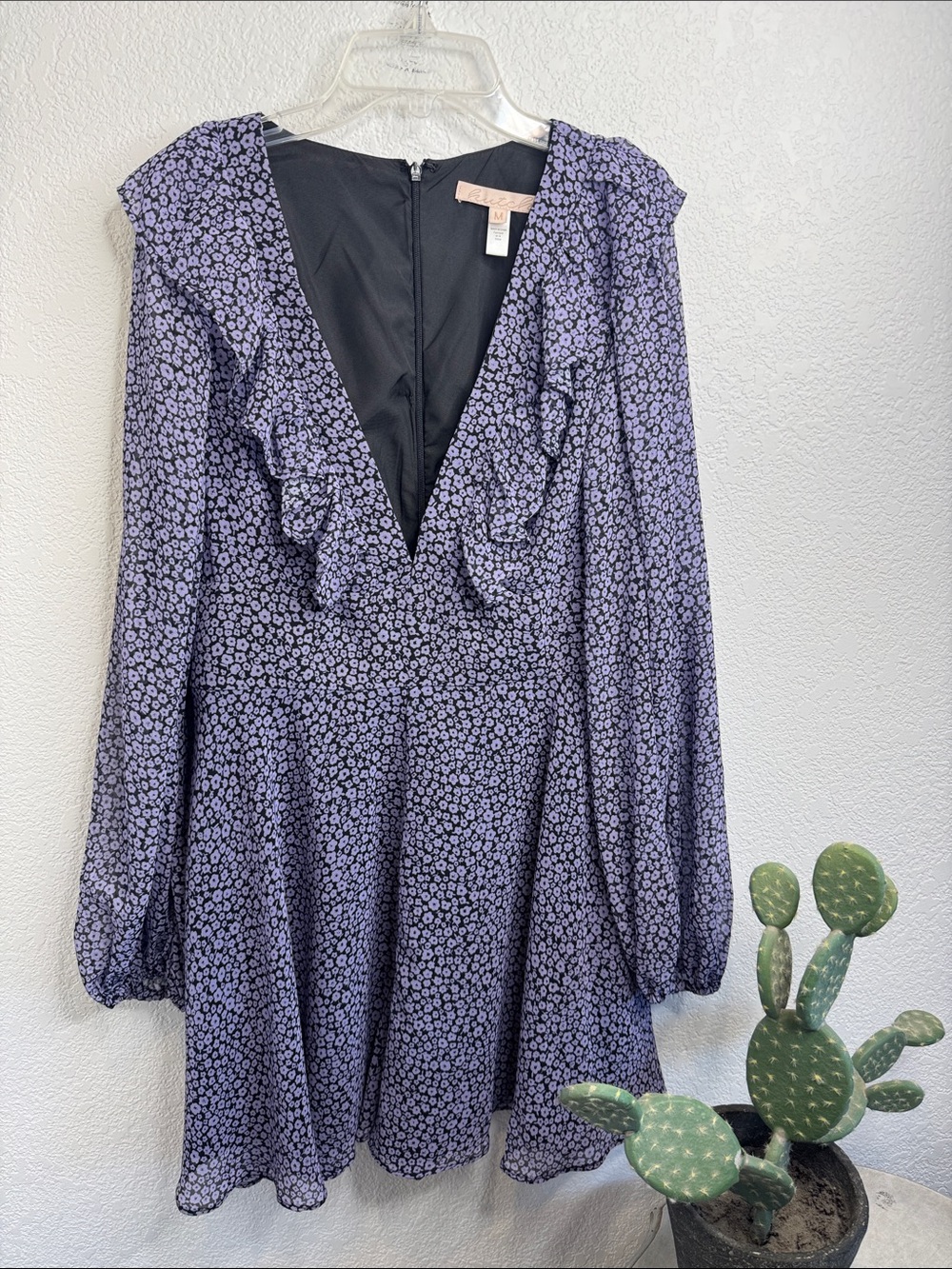 Hutch Romper deep V floral with pockets size medium